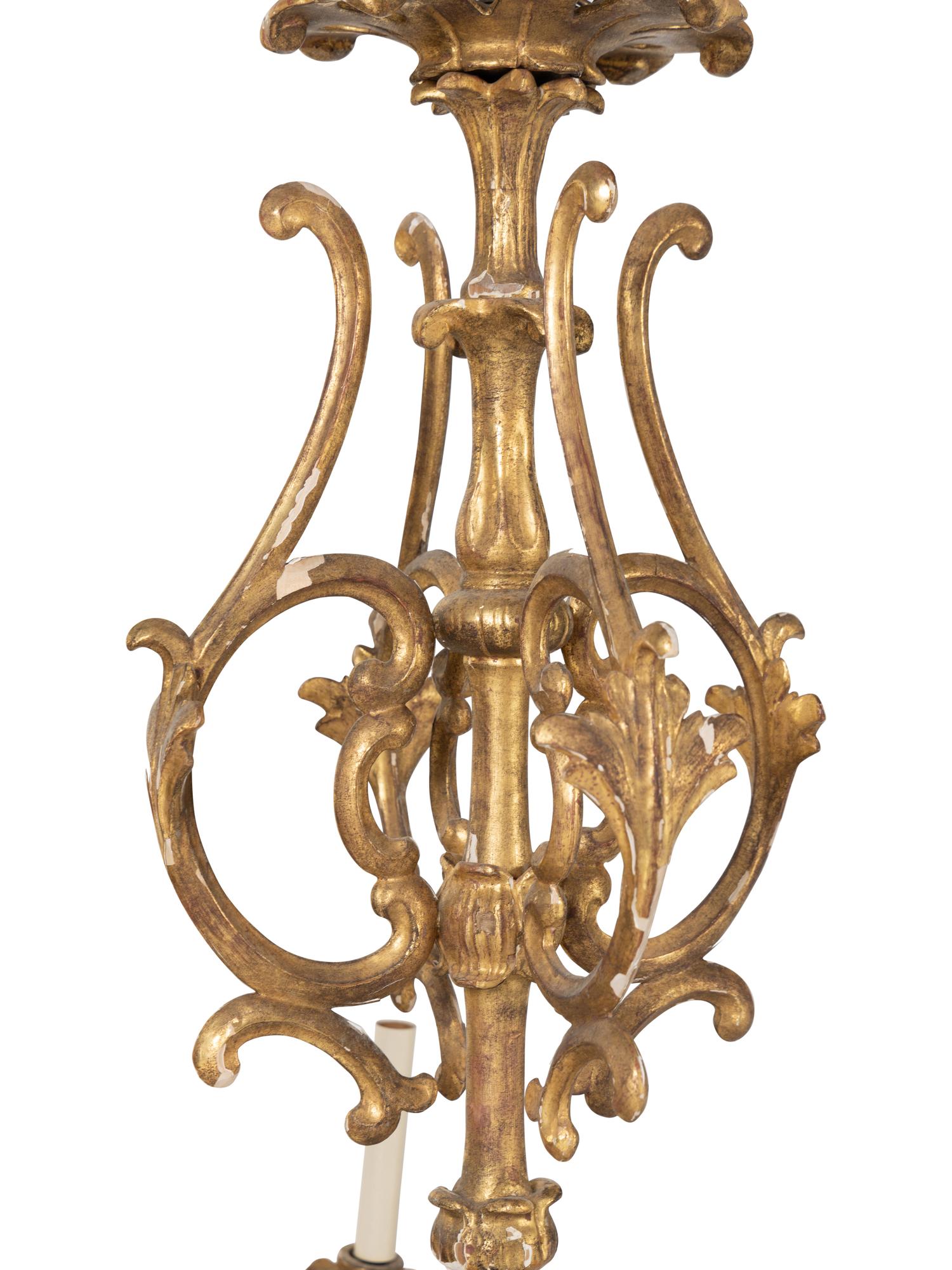 An Italian Giltwood Eight-Light Chandelier