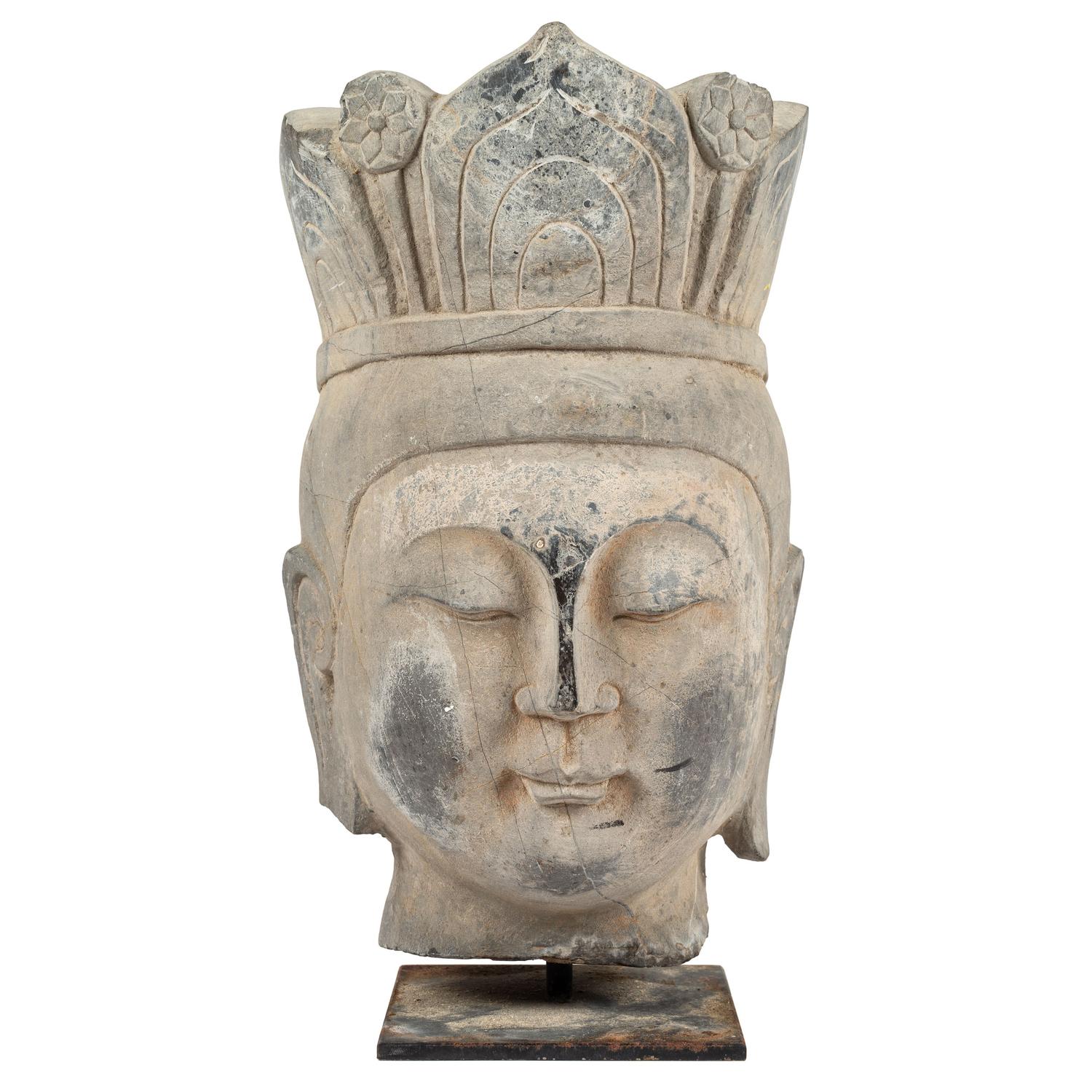 A Carved Stone Buddha Head