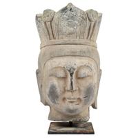A Carved Stone Buddha Head
