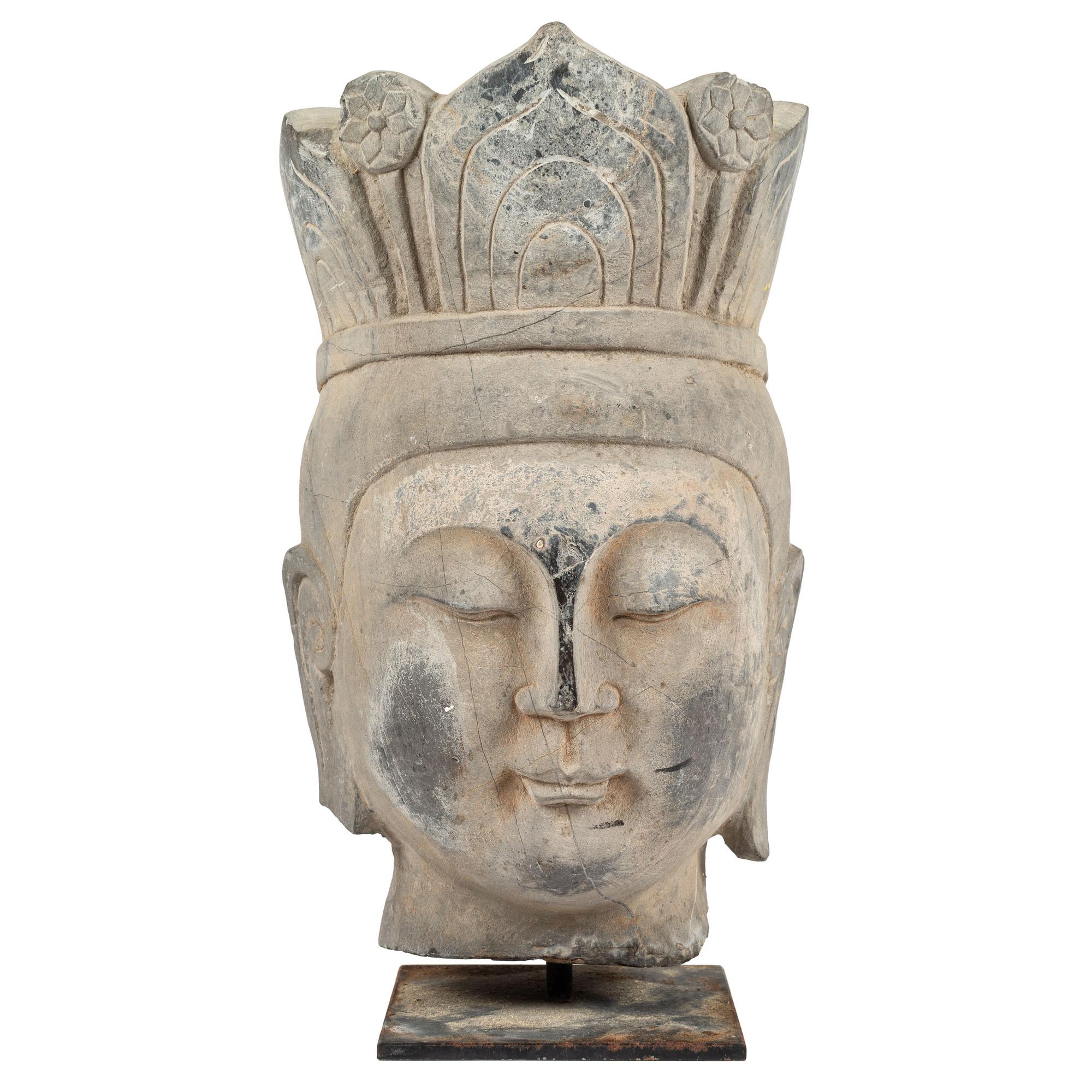 A Carved Stone Buddha Head