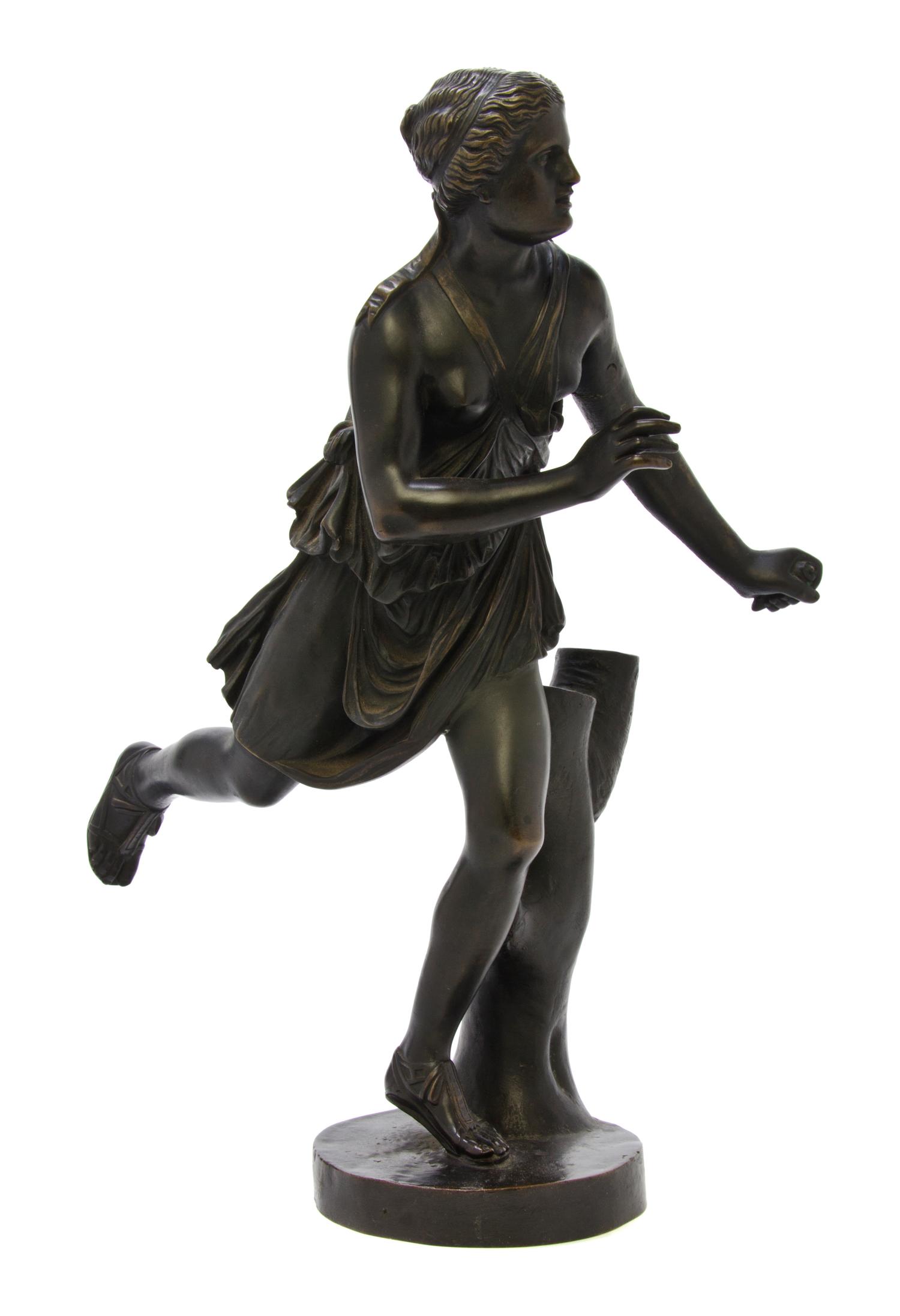 A Continental Bronze Figure, after the Antique, Height 16 1/2 inches.