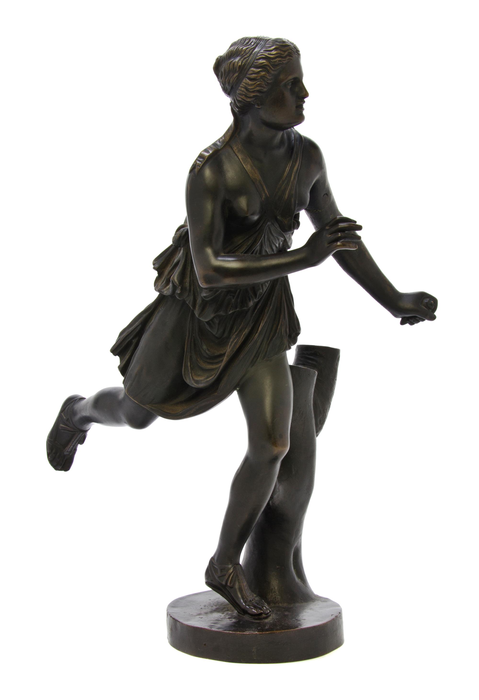 A Continental Bronze Figure, after the Antique, Height 16 1/2 inches.