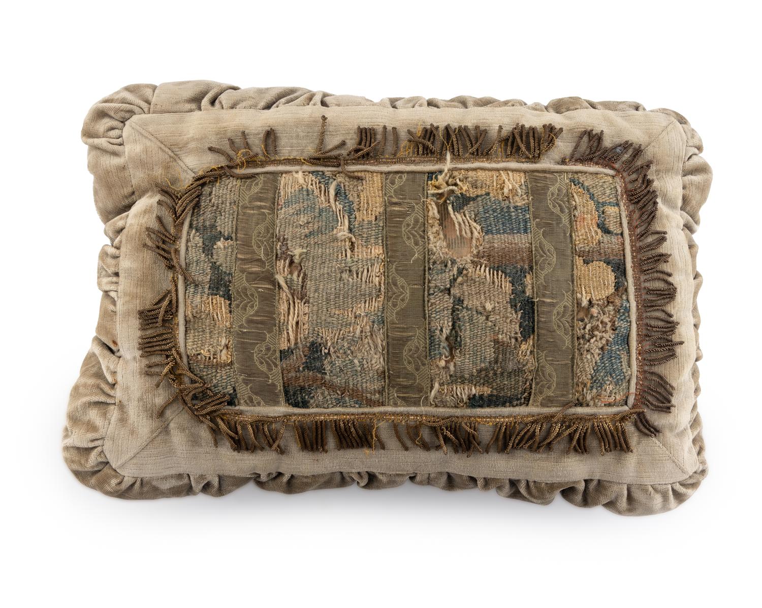 A Group of Three Tapestry Throw Pillows