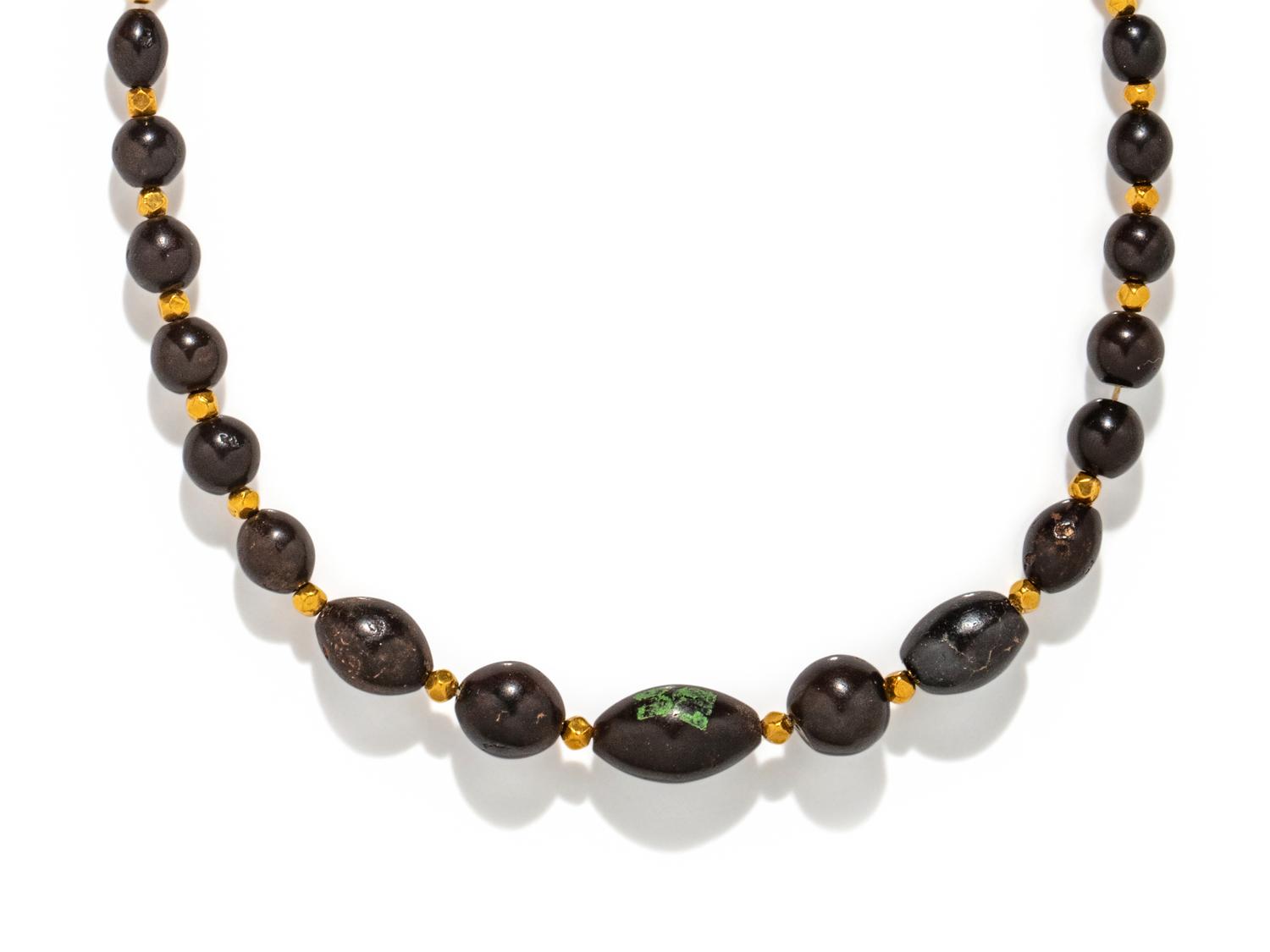 An Egyptian Hematite and Gold Bead Necklace
