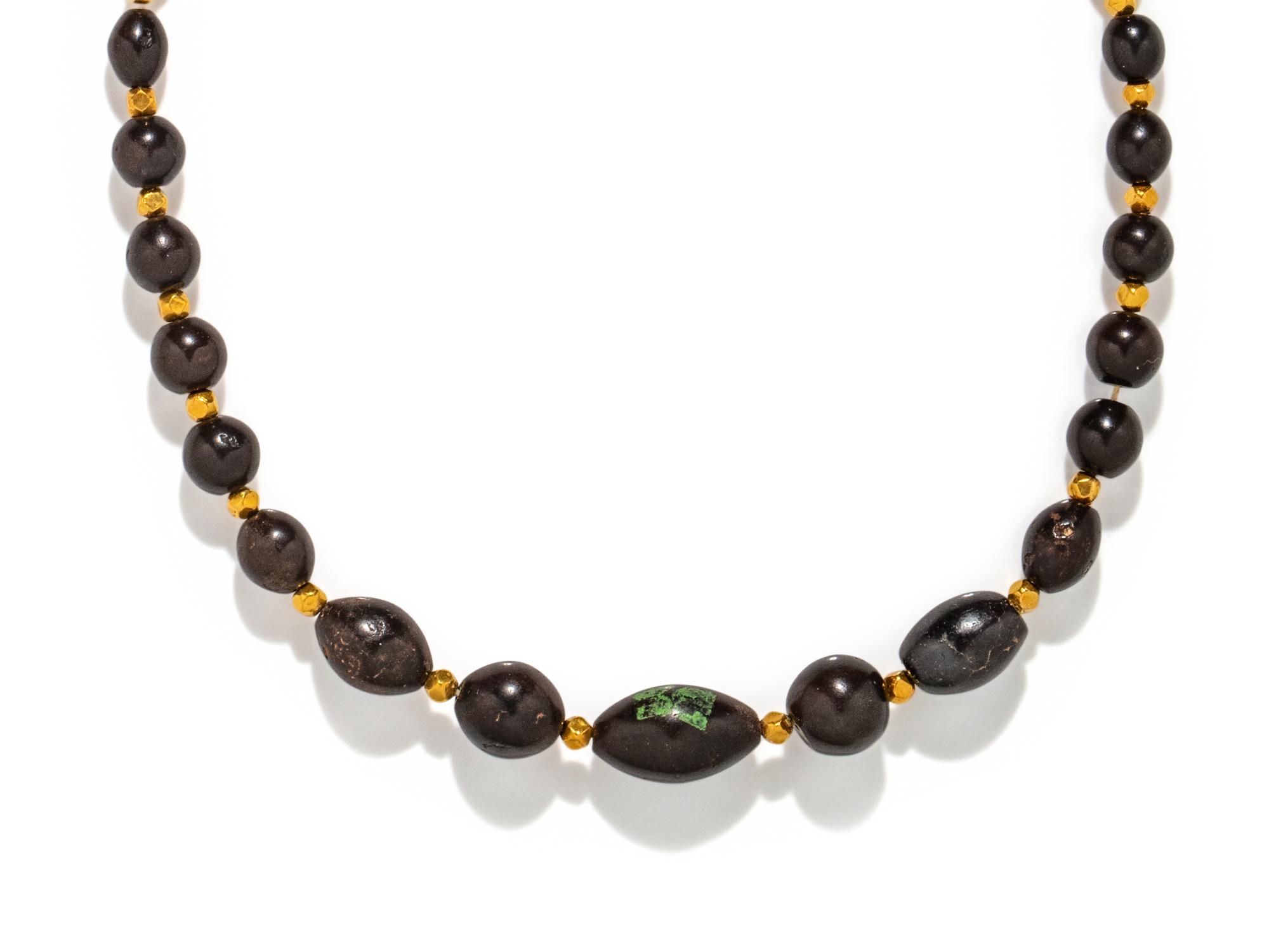 An Egyptian Hematite and Gold Bead Necklace