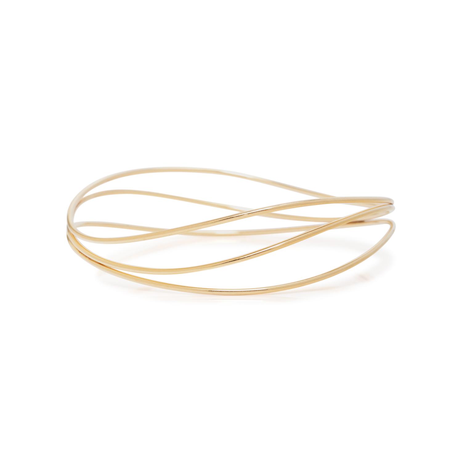 TIFFANY & CO., ELSA PERETTI, YELLOW GOLD 'WAVE' BANGLE BRACELET