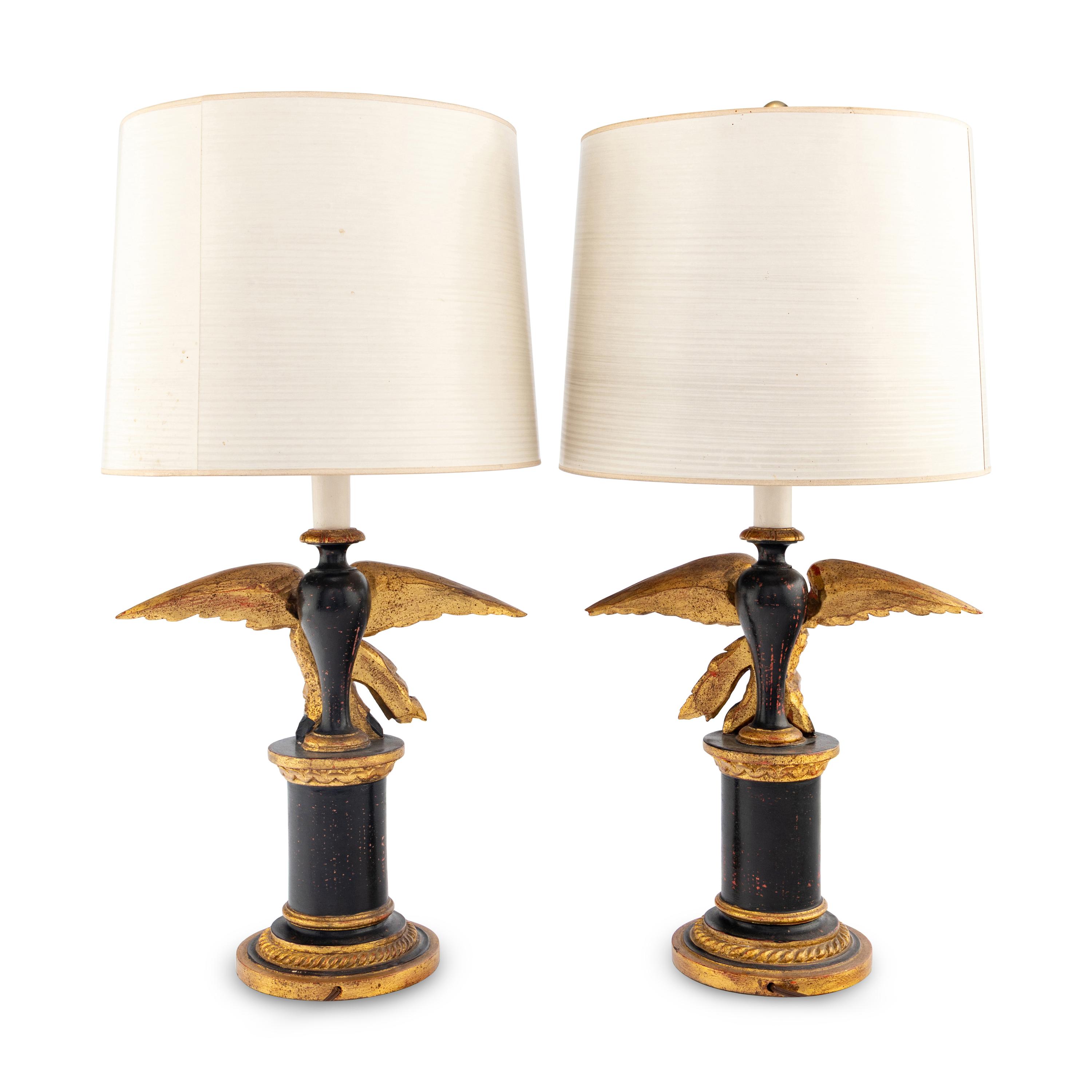 A Pair of Painted and Parcel Gilt Eagle-Form Lamps