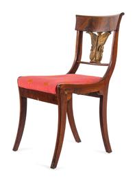 A Set of Four Italian Parcel Gilt Walnut Side Chairs
