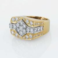 An 18K bicolor gold and diamond ring