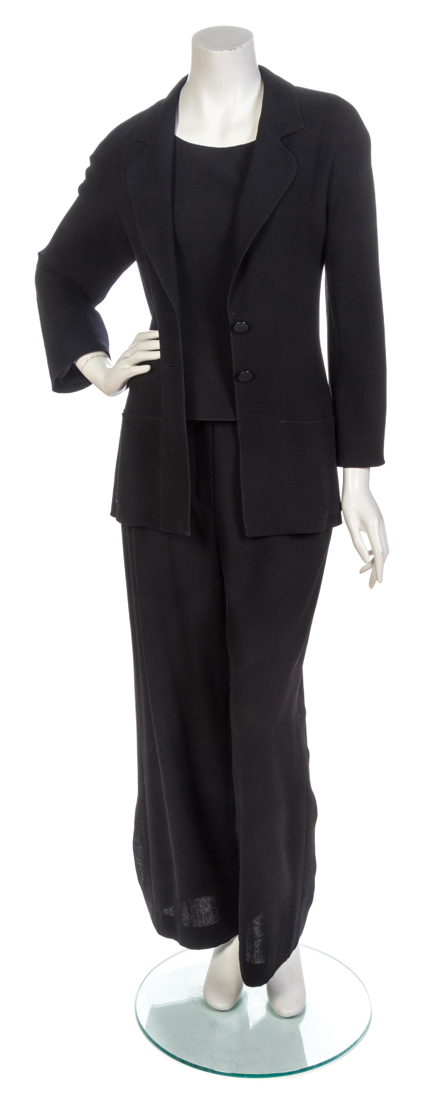 A Chanel Four Piece Black Wool Twill Ensemble,
