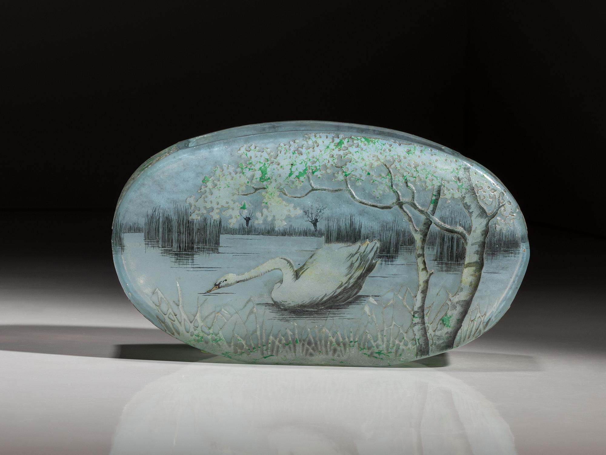 A Daum Enameled Glass Scenic Swan Vase