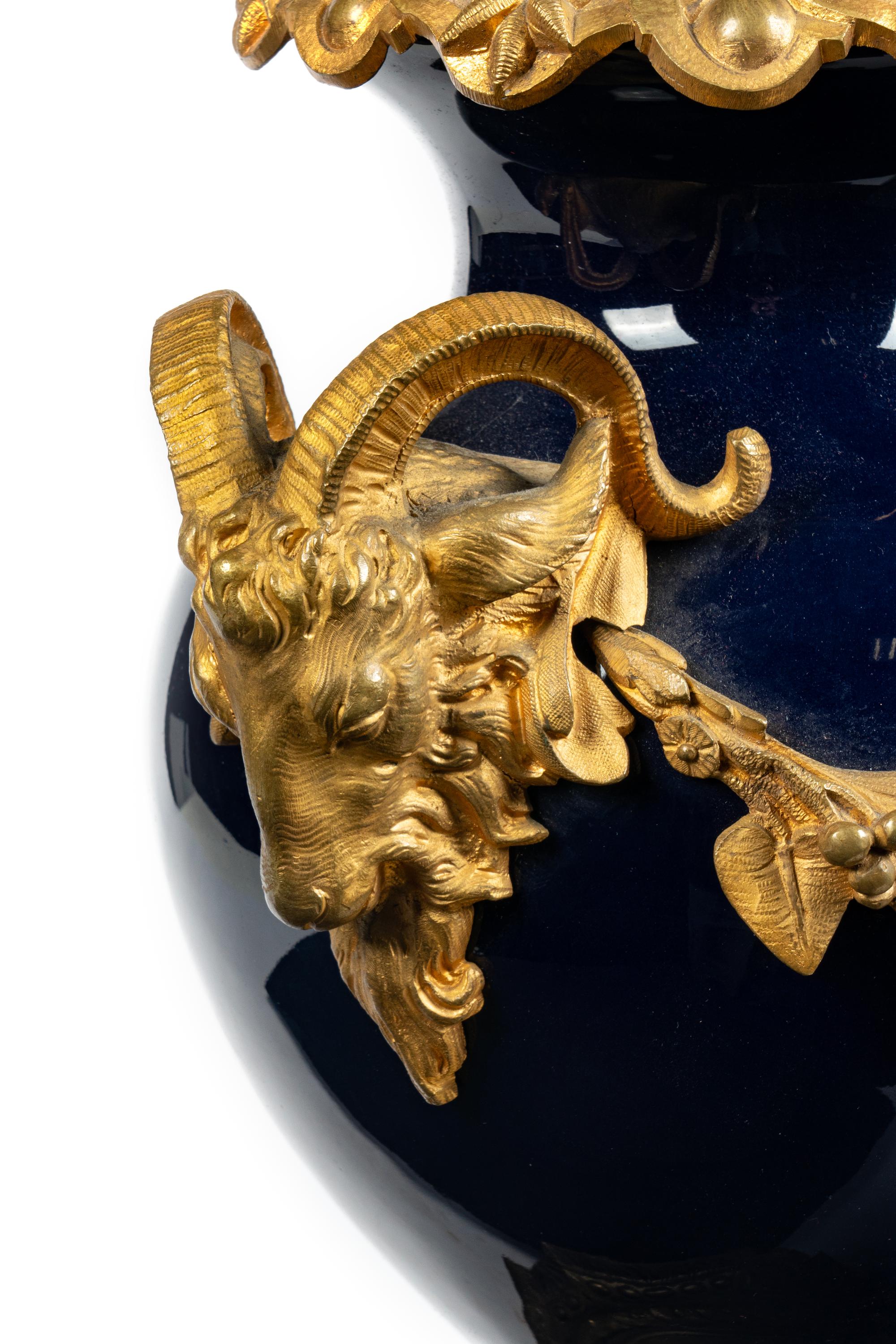 A Pair of Gilt Bronze Mounted Sèvres Style Porcelain Vases
