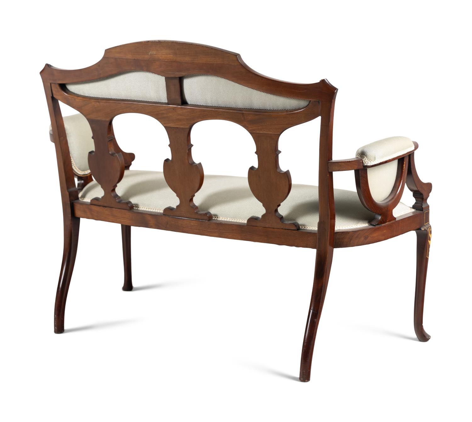 An Edwardian Mahogany and Marquetry Settee