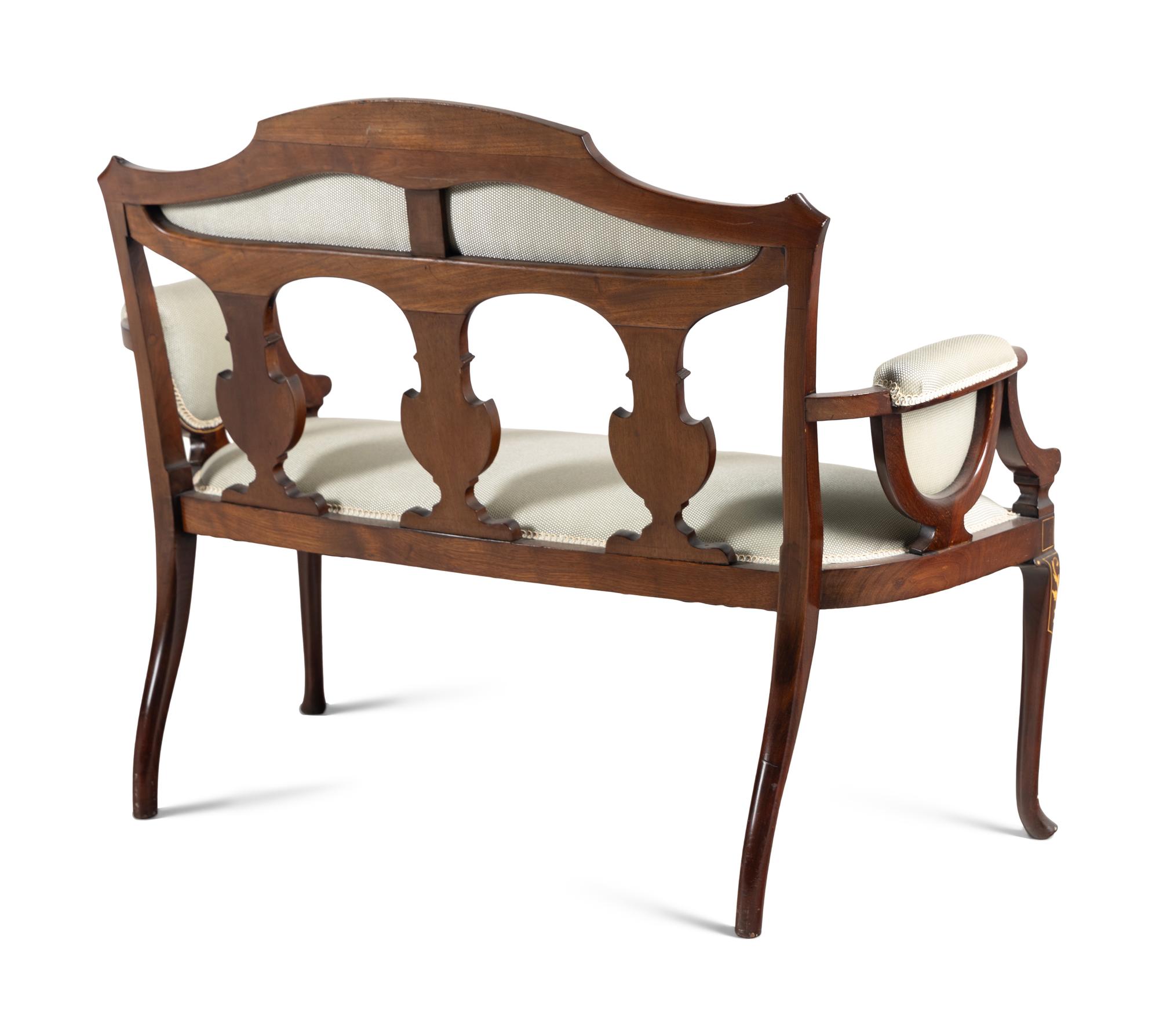 An Edwardian Mahogany and Marquetry Settee