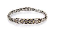 A Sterling Silver and 18 Karat Yellow Gold Bracelet, John Hardy, 17.00 dwts.