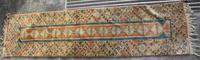 A Caucasian Wool Runner 8 feet 5 inches x 2 feet 2 inches.