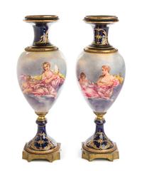 A Pair of Gilt Bronze Mounted Sevres Style Porcelain Urns Height 24 inches. — 19TH/20TH CENTURY