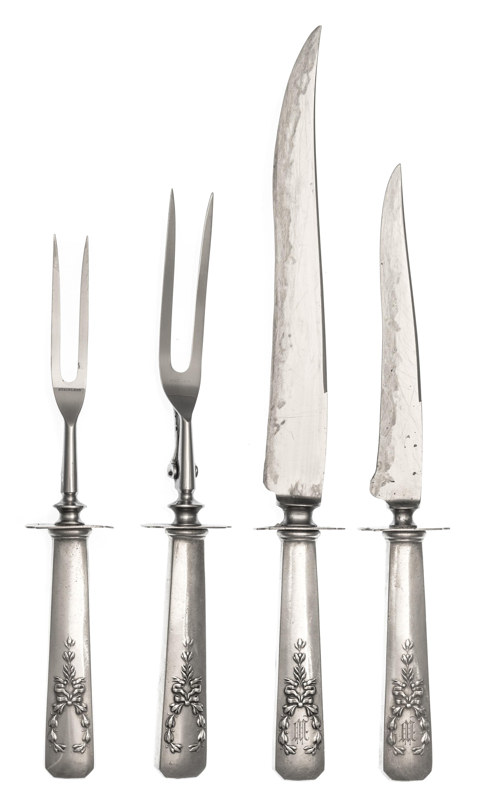 An American Silver Carving Set, , comprising two knives and two forks.