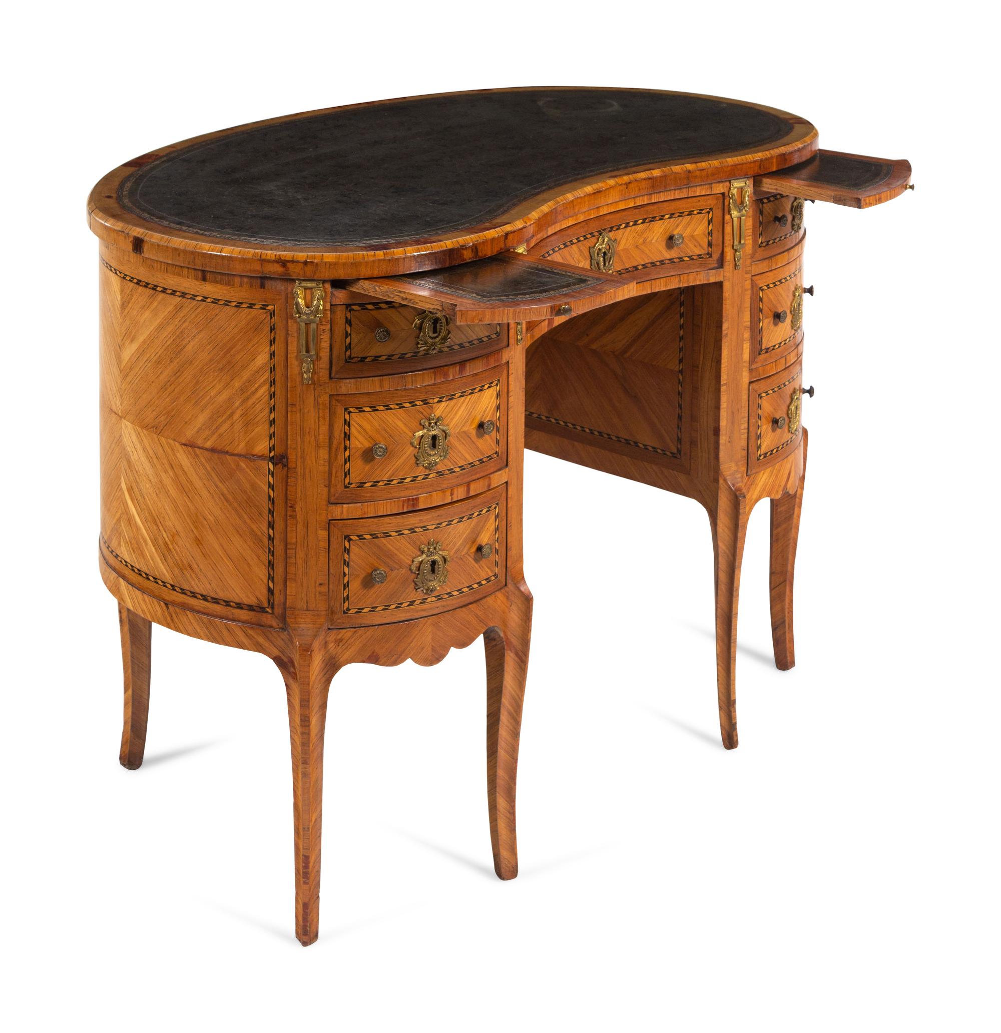 A Louis XV/XVI Transitional Style Kingwood and Parquetry Leather-Inset Reniform Bureau