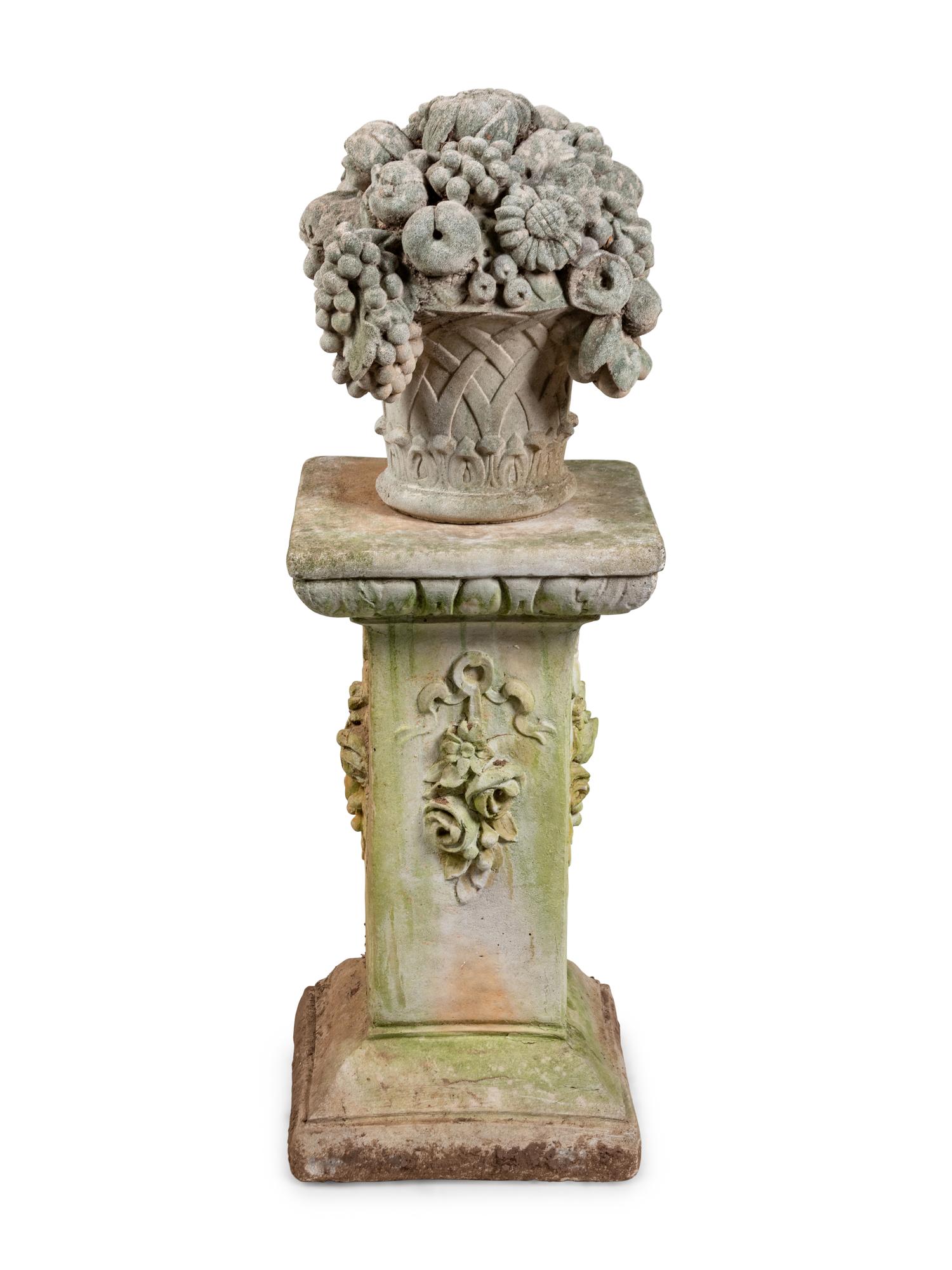 A Cast Stone Garden Ornament and Pedestal