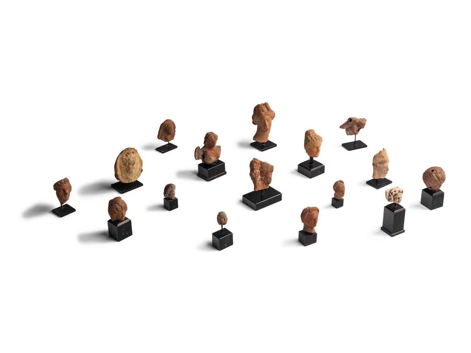 Sixteen Greco-Roman Terracotta Heads and Figures