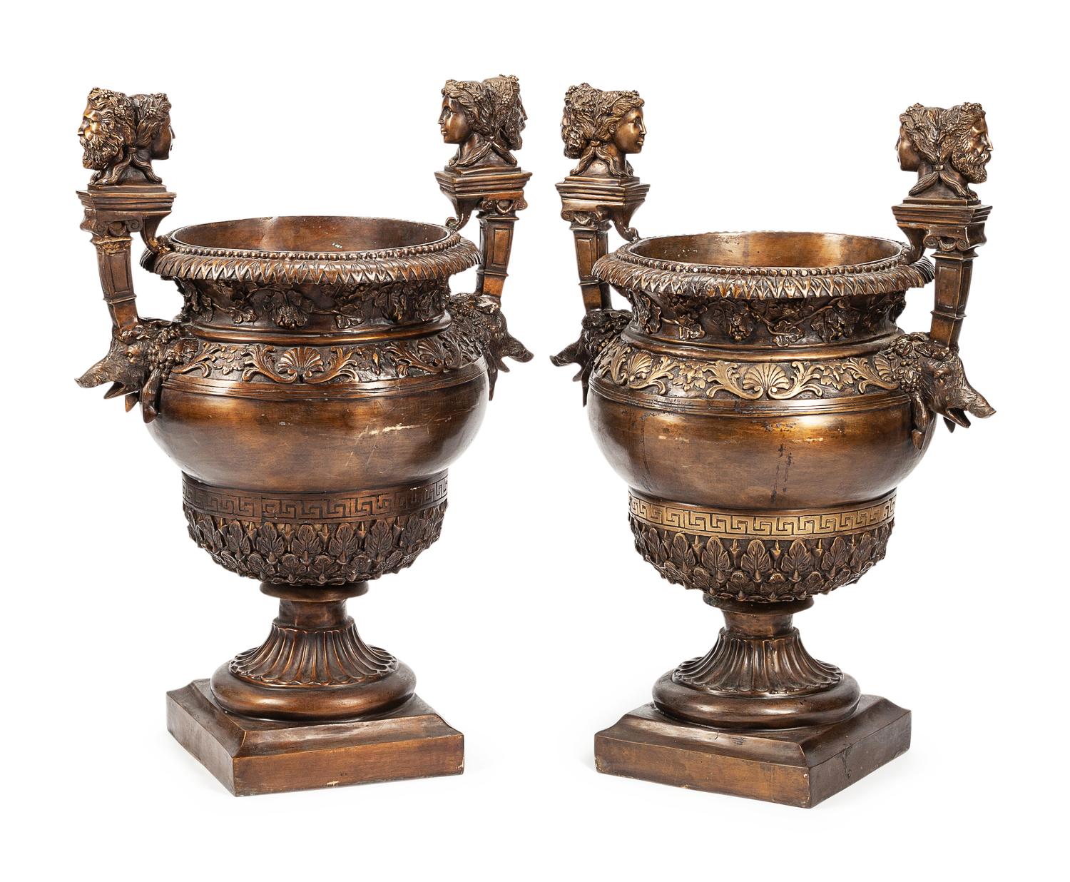 A Pair of Pompeian Style Patinated Metal Urns