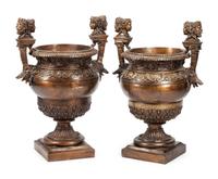 A Pair of Pompeian Style Patinated Metal Urns