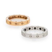 Roberto Coin, Pair of White and Yellow Gold Rings