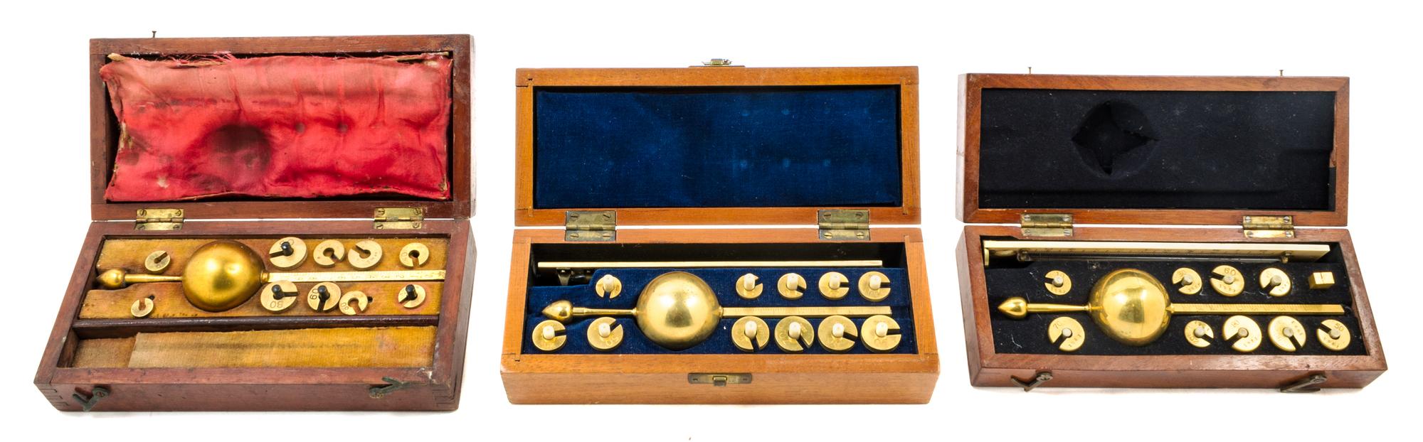 A Group of Three English Brass Hydrometers Length of longest 7 1/2 inches.