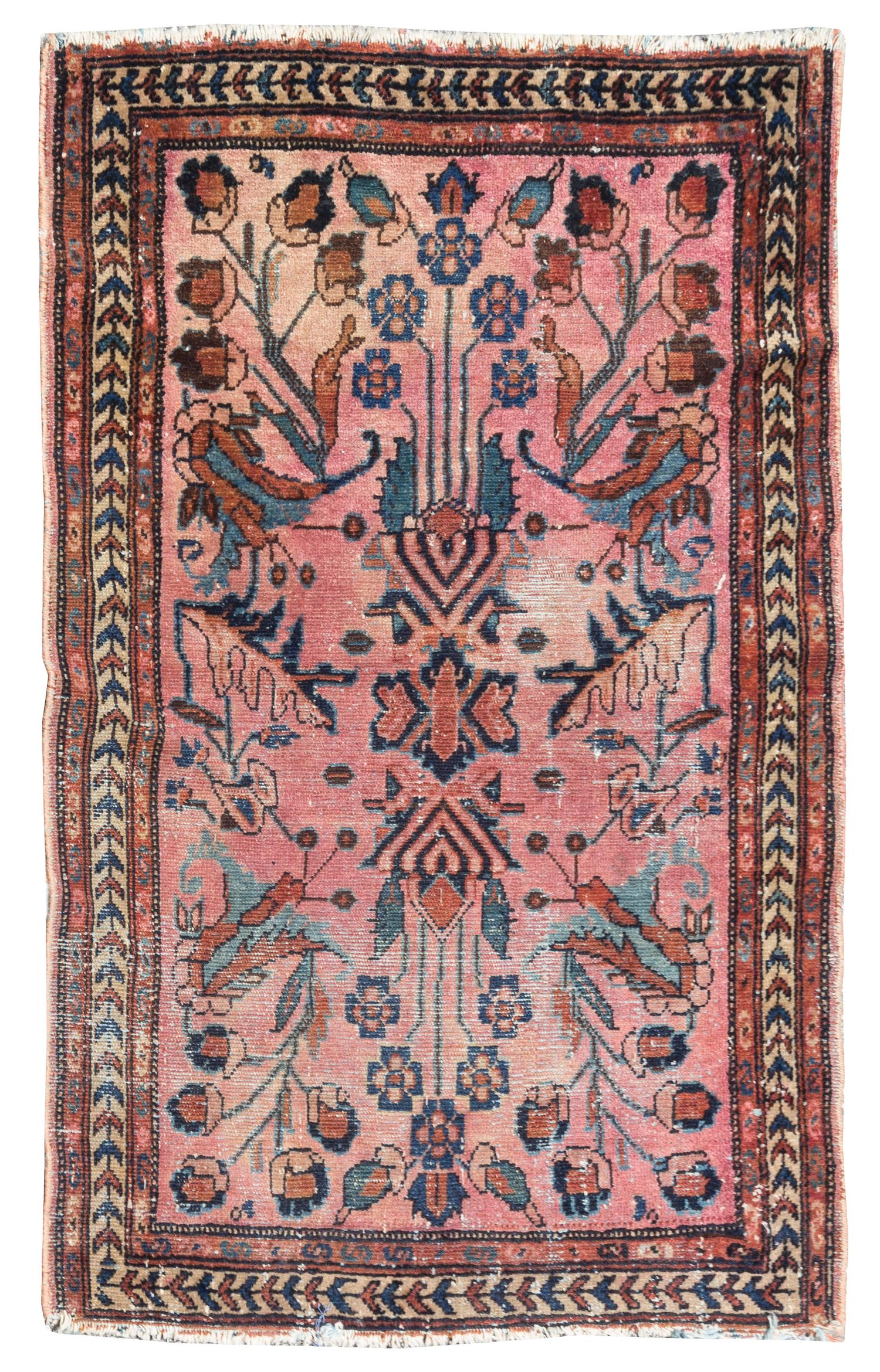 A Lilihan Wool Rug 3 feet 9 inches x 2 feet 9 inches.