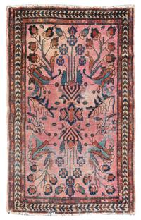 A Lilihan Wool Rug 3 feet 9 inches x 2 feet 9 inches.