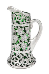 A Silver Overlay Glass Pitcher Height 9 1/8 inches.