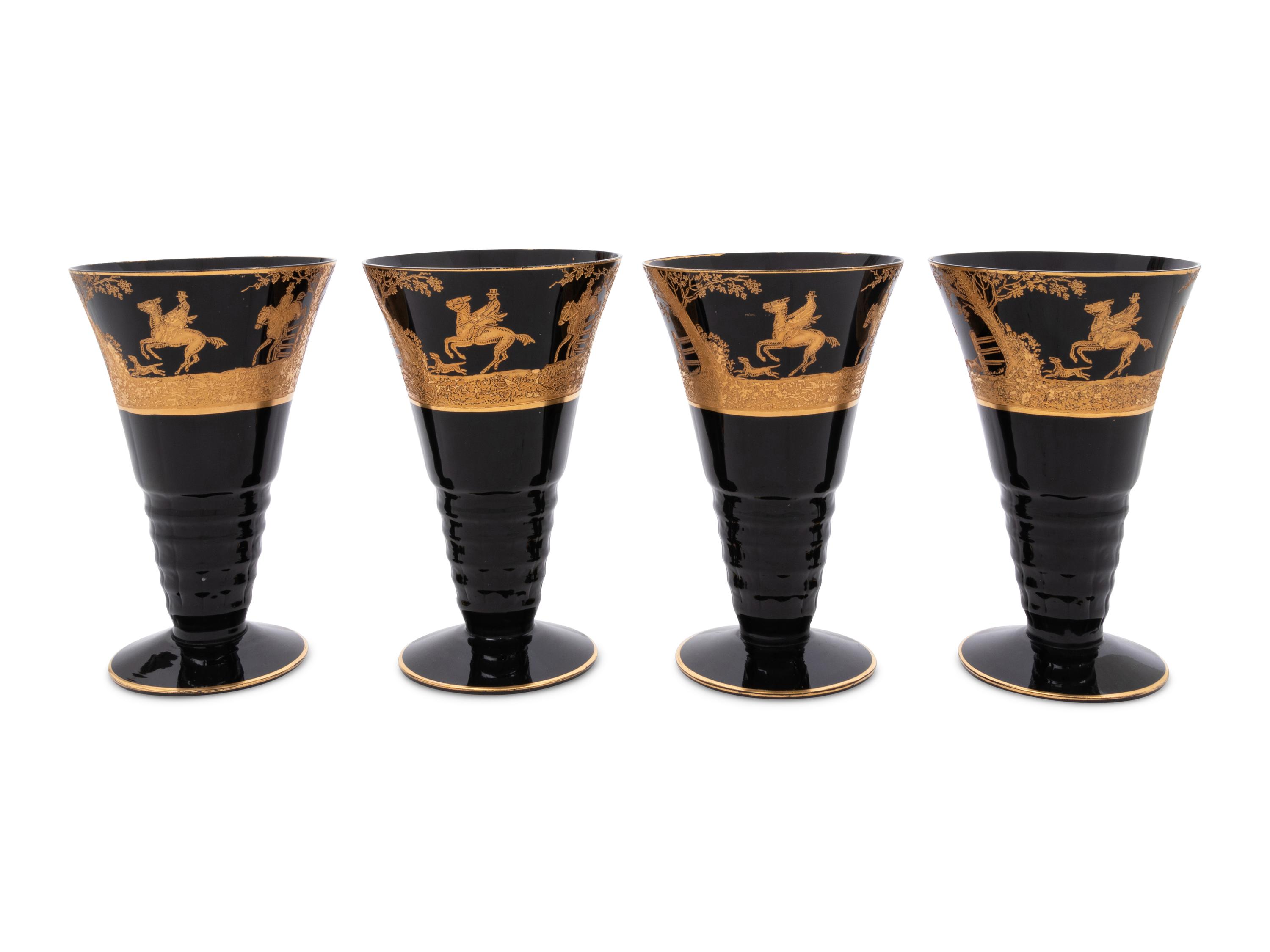 Four Continental Gilt Decorated Dark Amethyst Glass Goblets Depicting Hunting Scenes