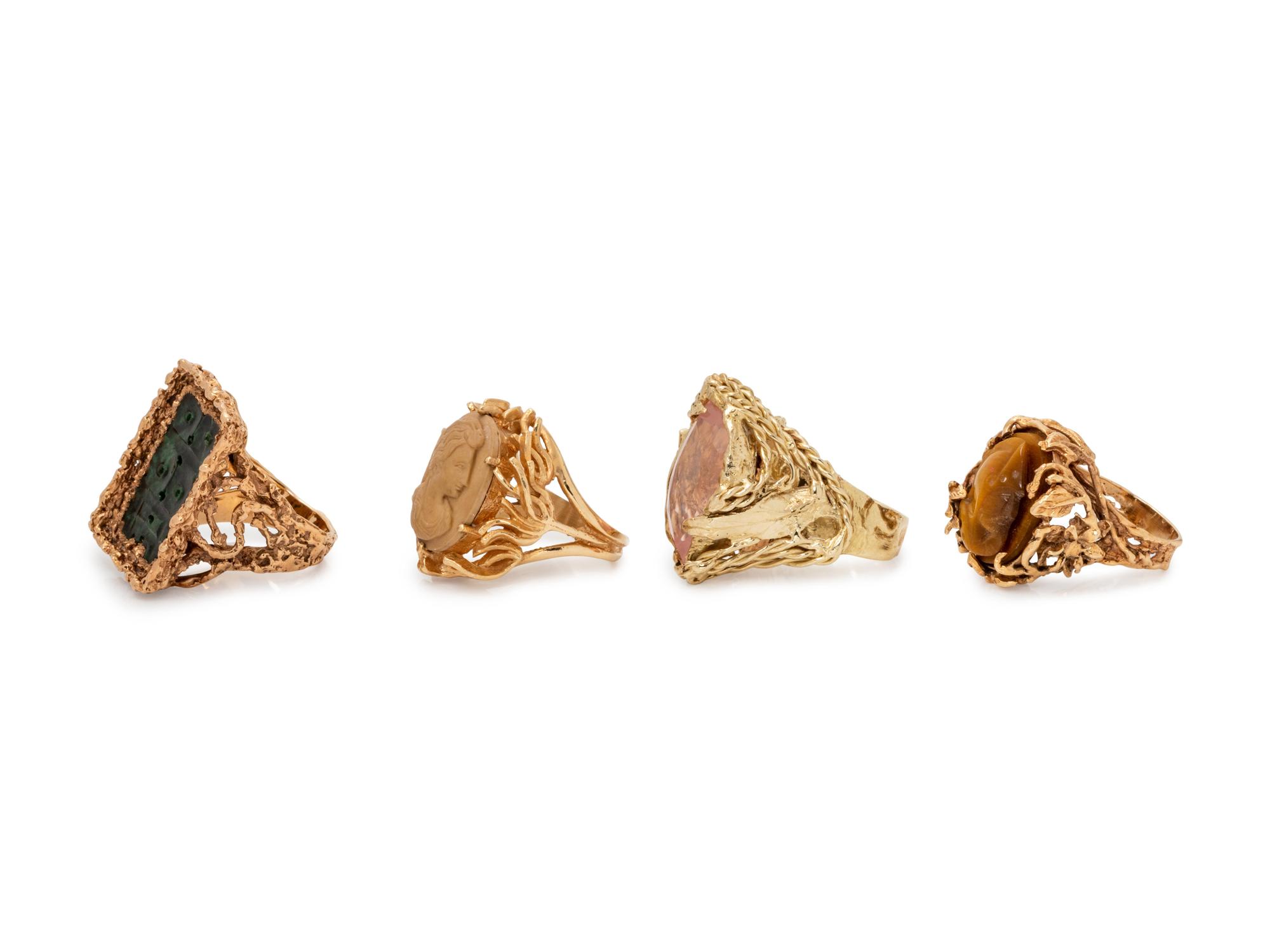 A Collection of 14 Karat Yellow Gold and Hardstone Rings,
