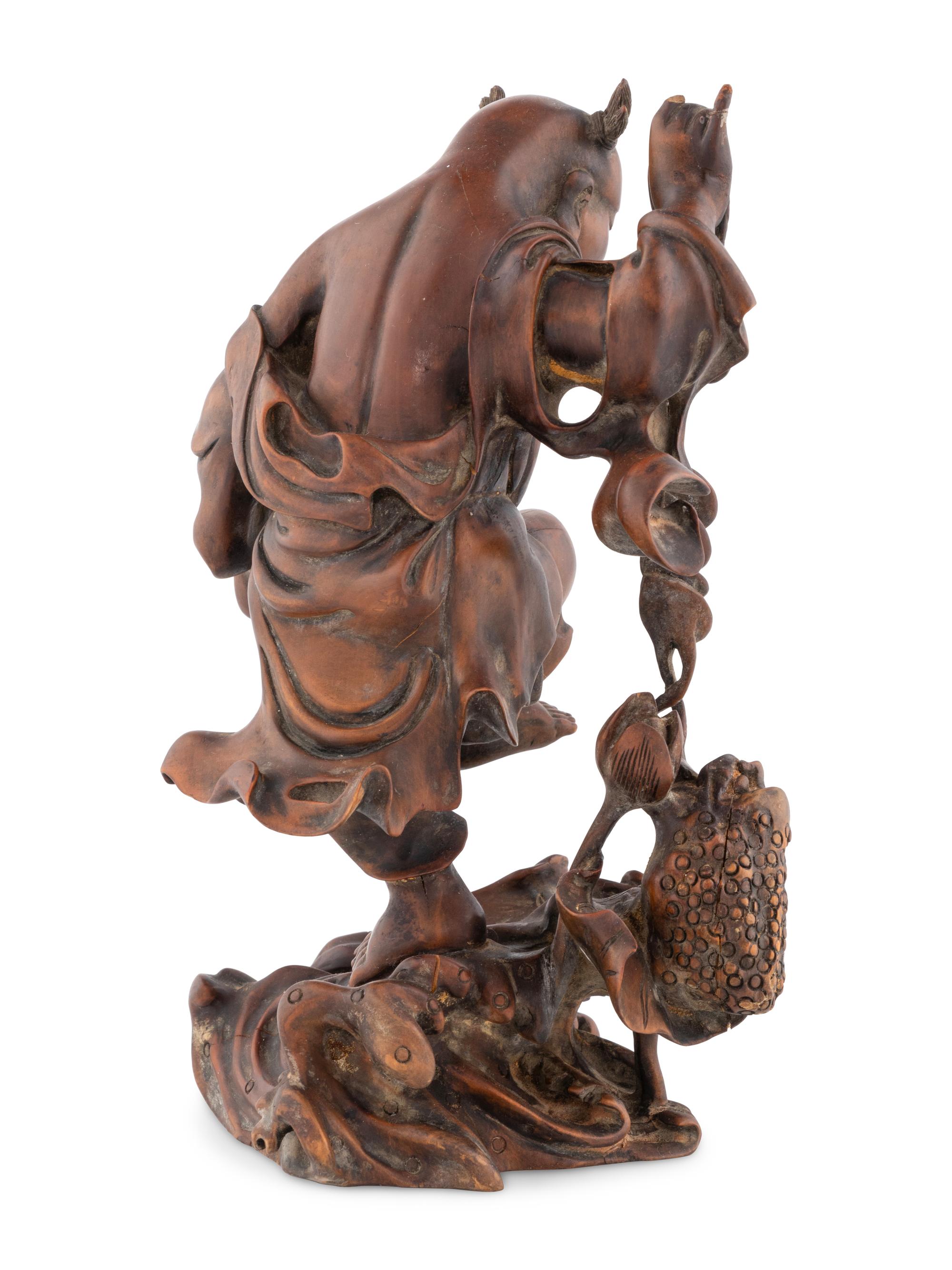 A Chinese Wood Figural Group of Liuhai and Three-Legged Toad