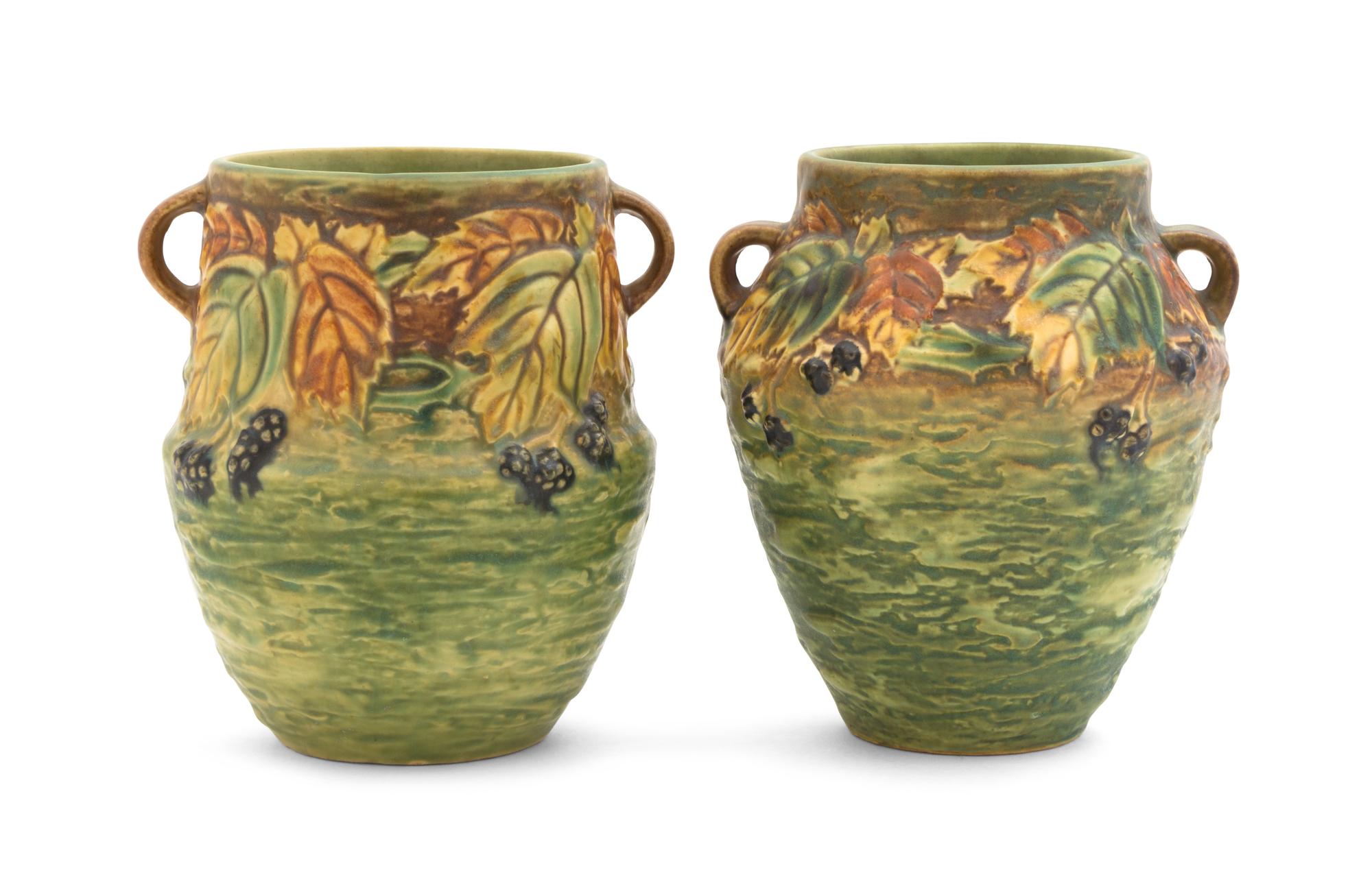 Two Roseville Blackberry Pottery Vases Height of each 6 inches.