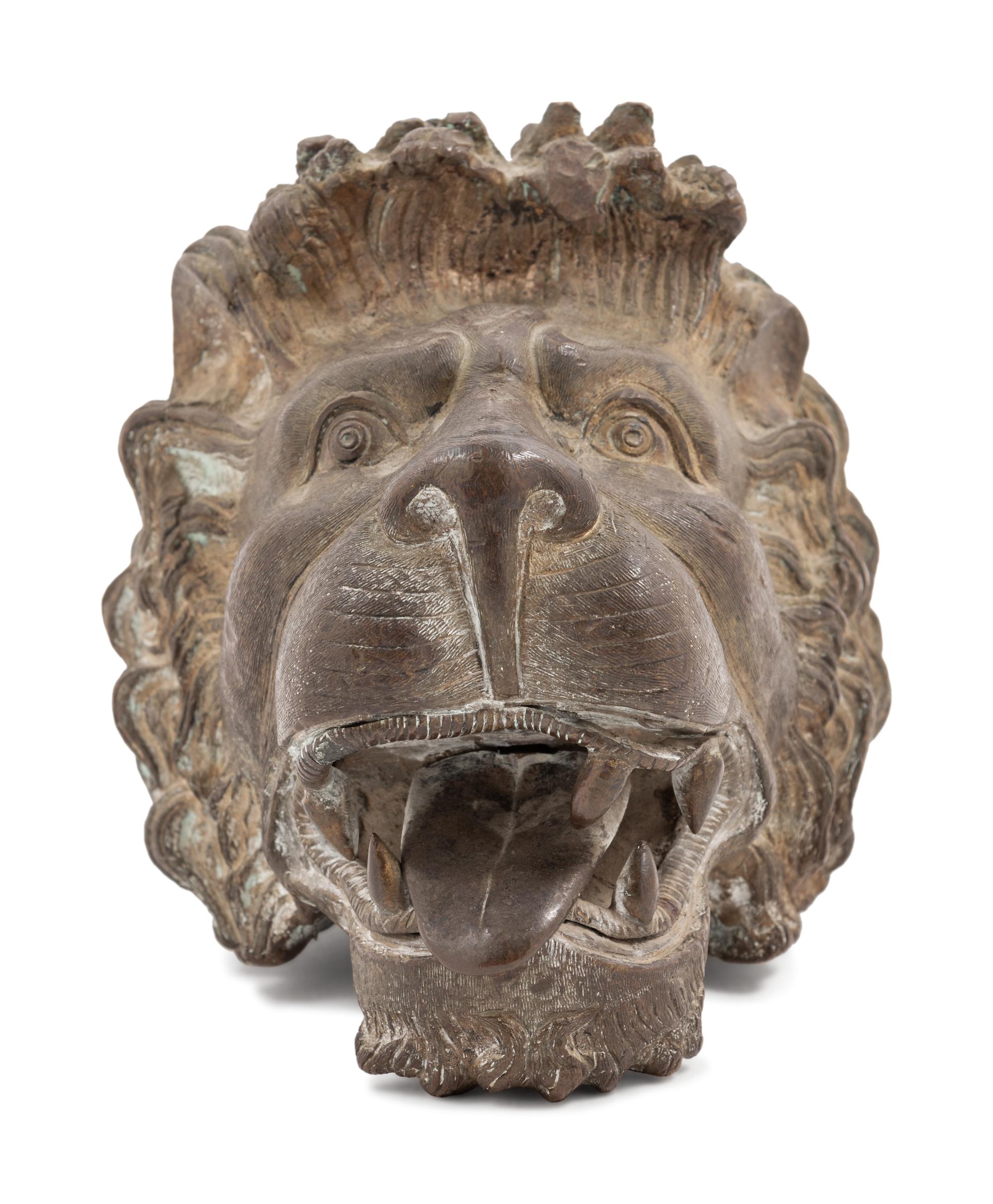 A Continental Bronze Lion Head Spout