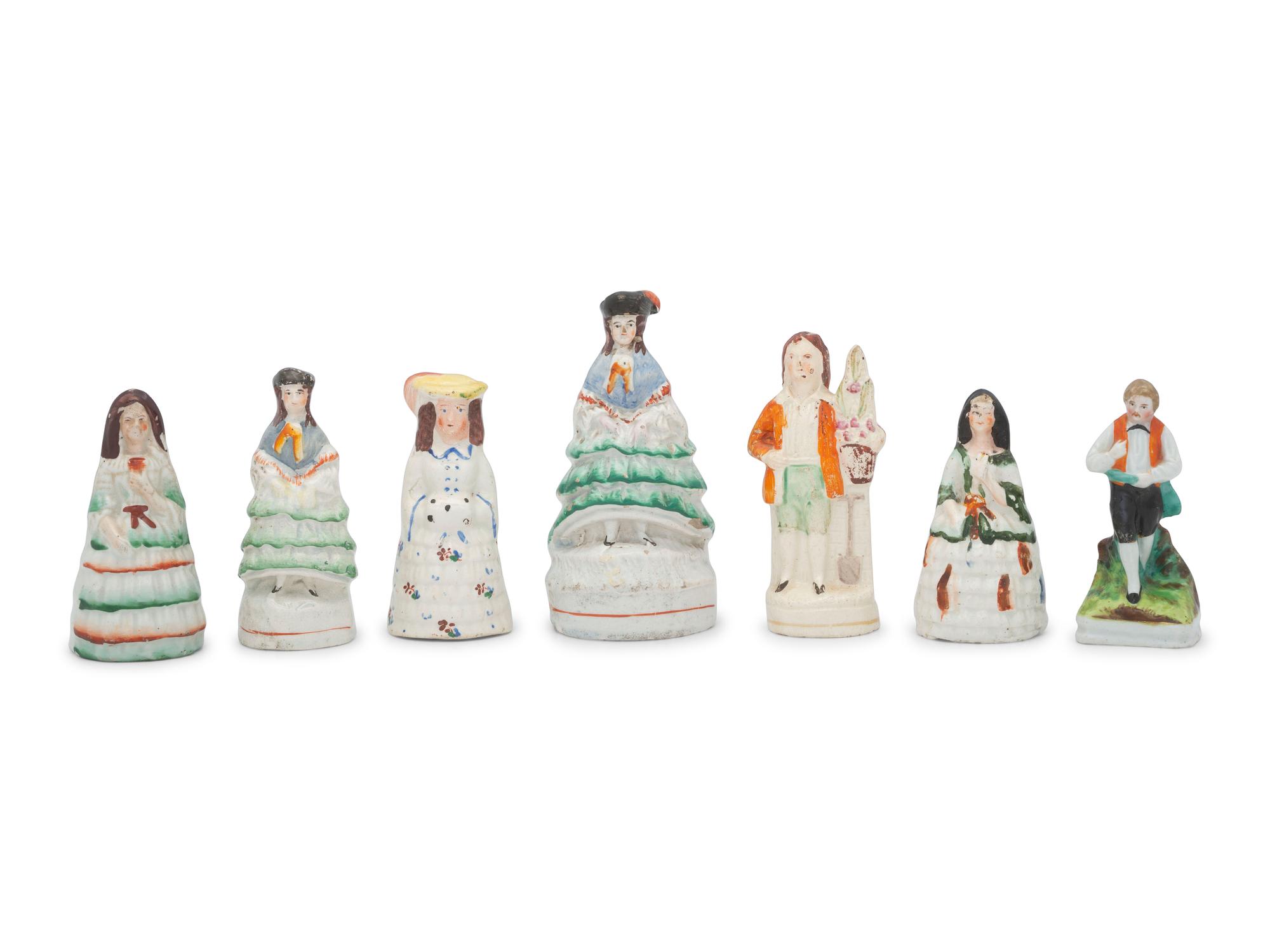 Seven Miniature Staffordshire Figures