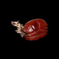 An Etruscan Carnelian Scarab with Warrior on Horseback and a Griffin — Set in a 19th Century gold swivel fob