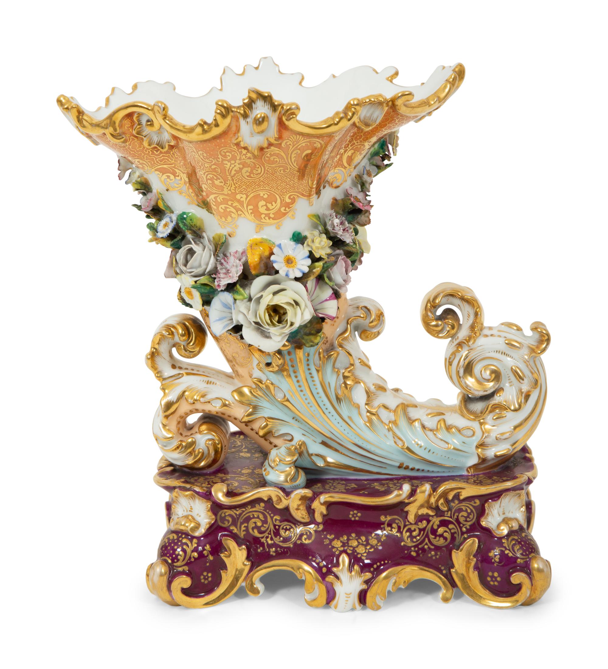 A Signed Jacob Petit Porcelain Cornucopia Vase on a Serpentine Base