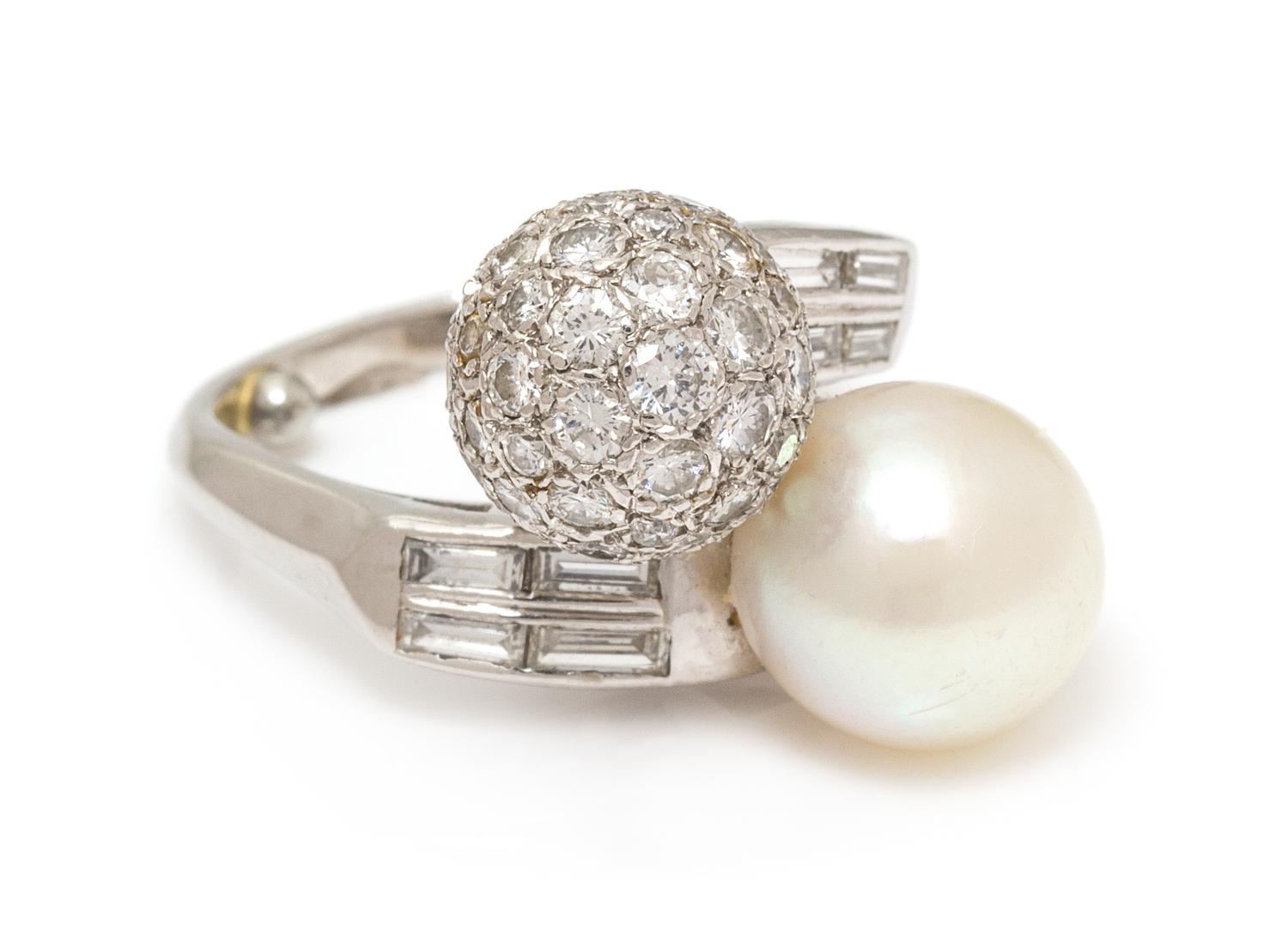A Platinum, Cultured Pearl and Diamond 'Toi et Moi' Ring, 6.75 dwts.
