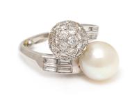 A Platinum, Cultured Pearl and Diamond 'Toi et Moi' Ring, 6.75 dwts.