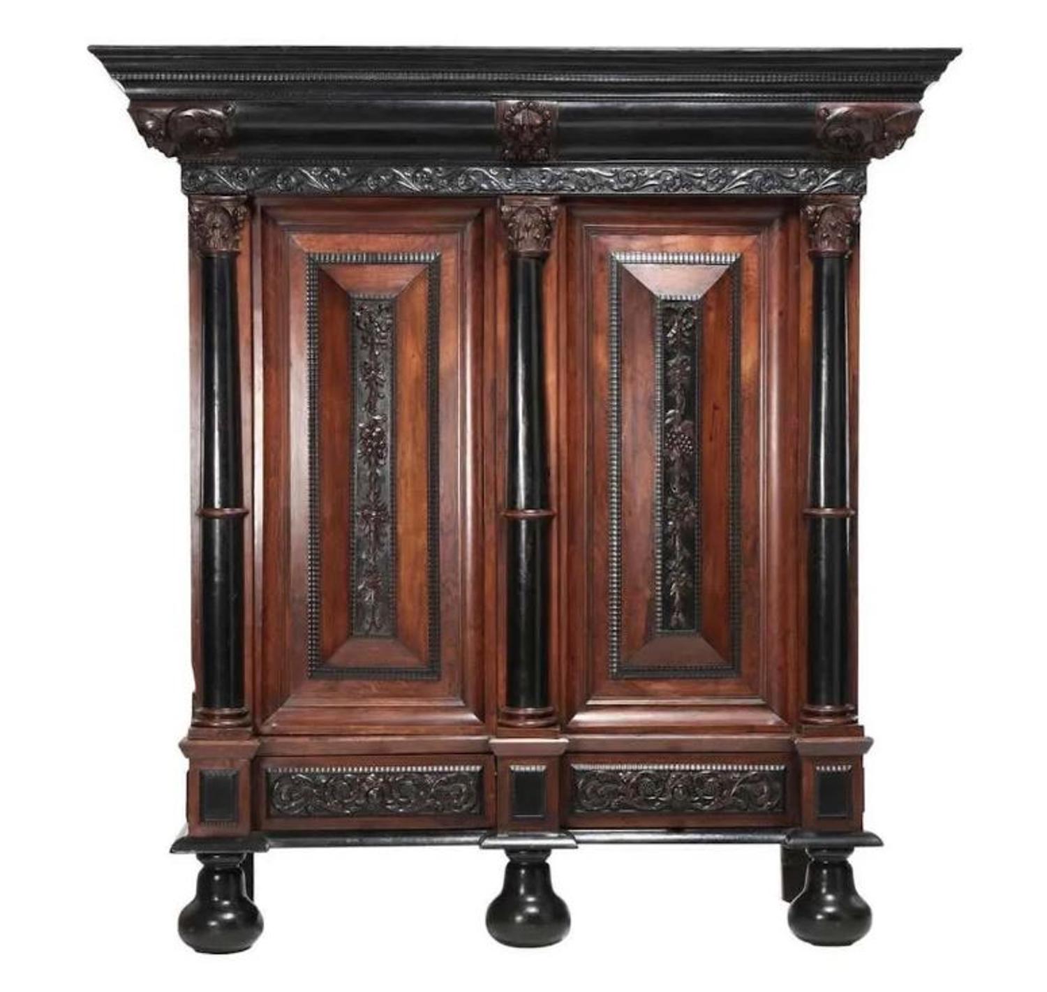 A Flemish Part-Ebonized Carved Rosewood Armoire — 17TH/18TH CENTURY