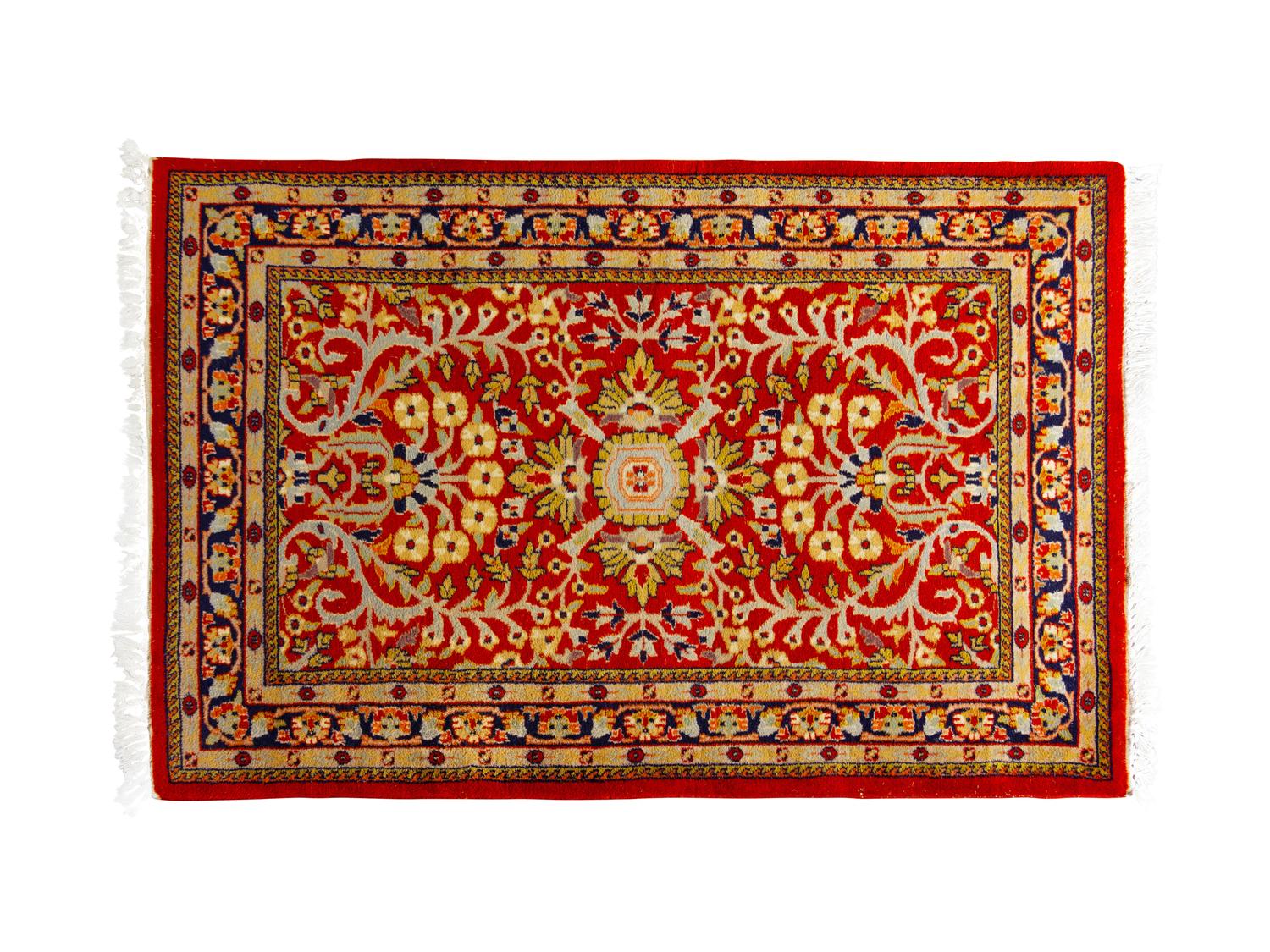 A Group of Three Wool Rugs