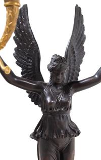 A Pair of Empire Style Gilt and Patinated Bronze Four-Light Candelabra