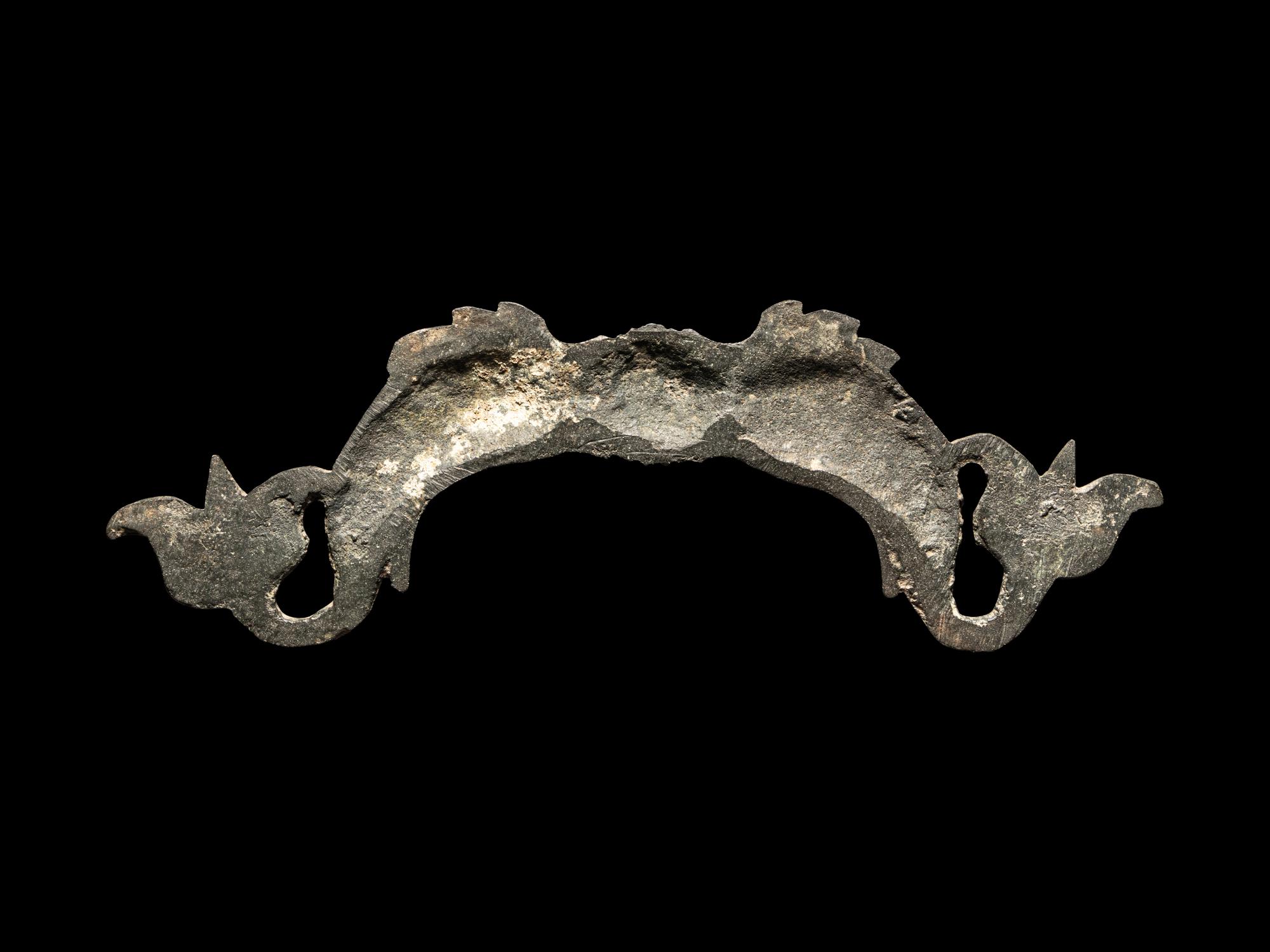 A Roman Bronze Double-Dolphin Handle