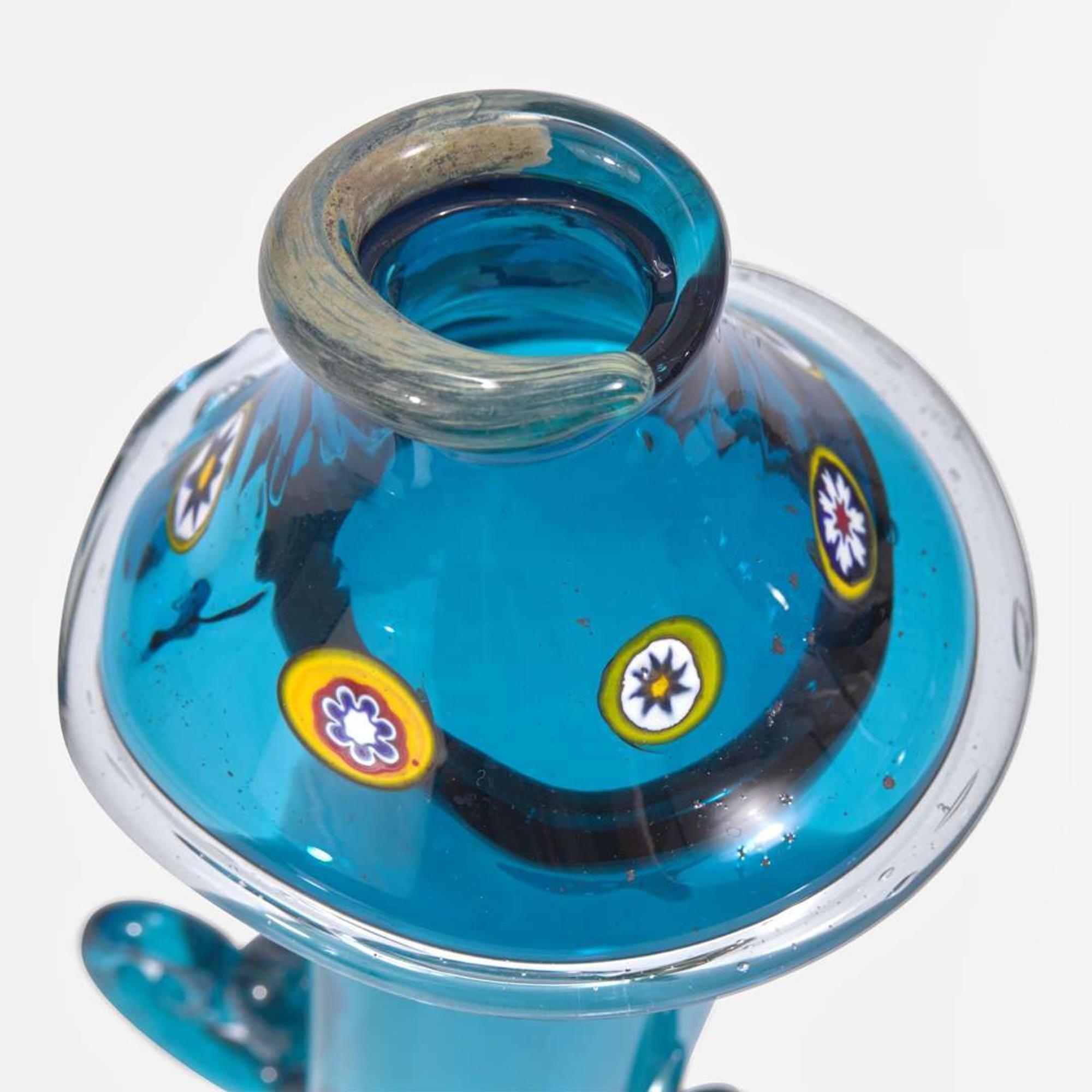 Thomas Kekic (American, 1943-1986), Kim Newcomb (American, 20th Century) An Iridescent Pasta Vitrea Footed Mug, Glass Goblet, and Glass "Bug House", USA, 1972