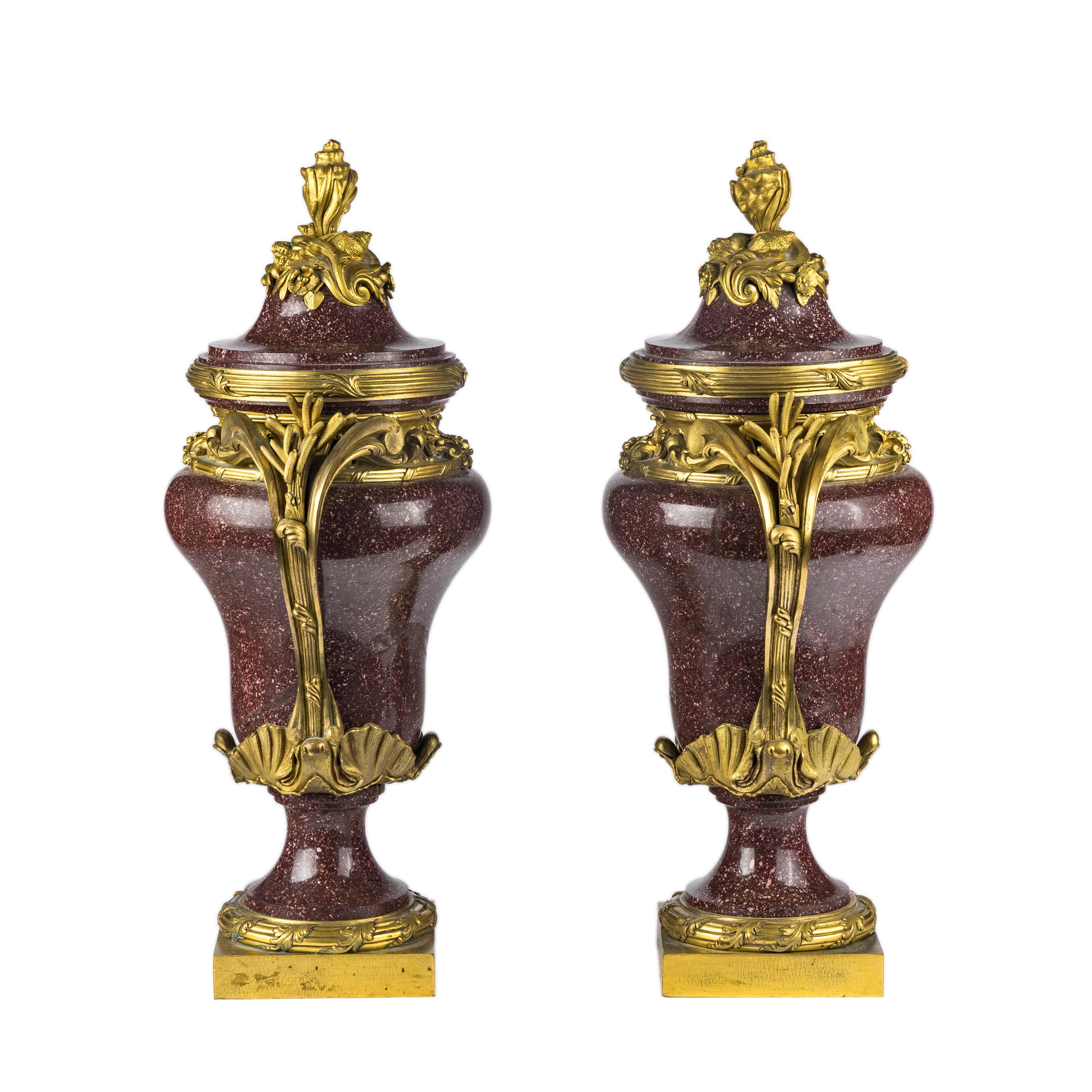 A Pair of Gilt Bronze Mounted Porphyry Urns