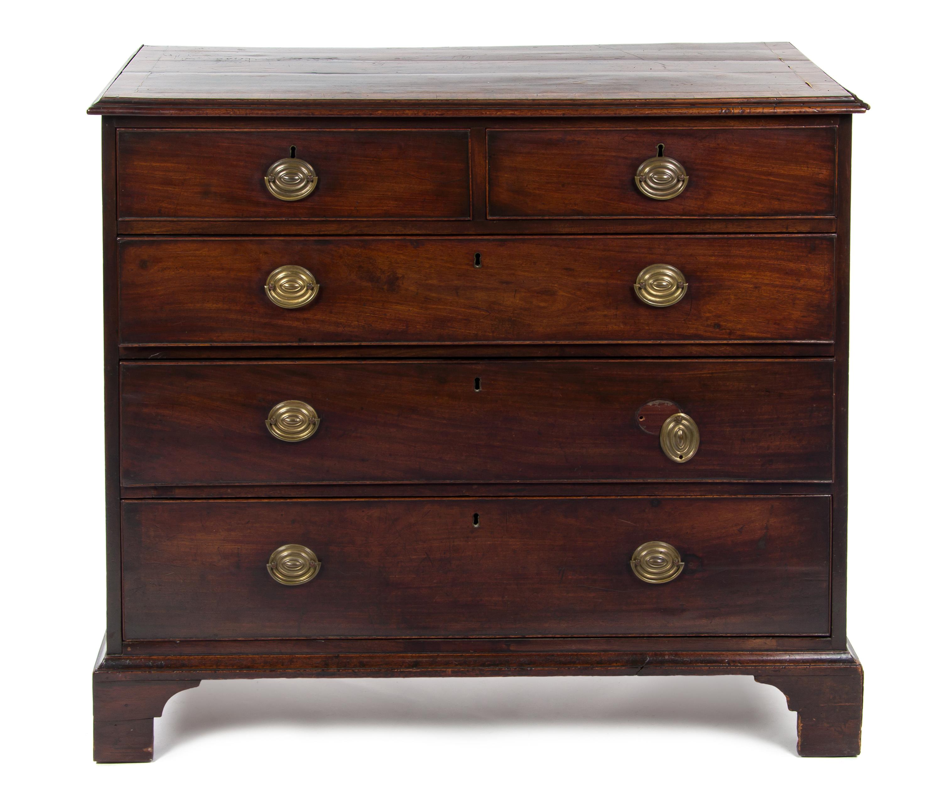 An English Mahogany Chest of Drawers, MID-19TH CENTURY, Height 37 1/2 x width 43 x depth 21 1/2 inches. — MID-19TH CENTURY,