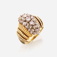 An eighteen karat gold and diamond ring